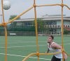 Soccer player looking at a ball in the air, click to see more.