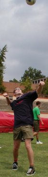 An Arrowman playing Volleyball.