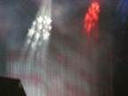 American flag projected on stage waterfall.