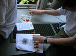 Arrowman making a bone choker