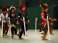 Tsali Lodge dancers performing the Bar the Way dance