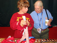Dancer carefully wrapping up a roach